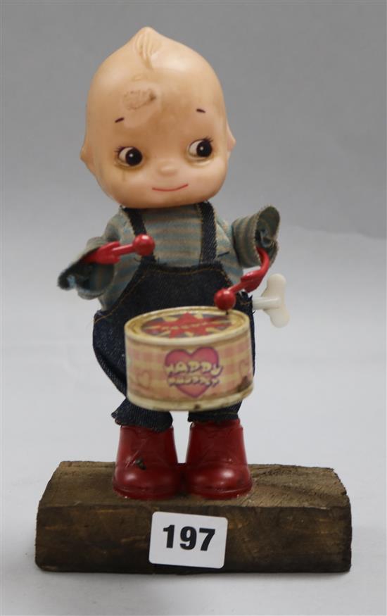 A toy wind up drummer boy / doll